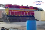 Three GP 38s visible in the yard